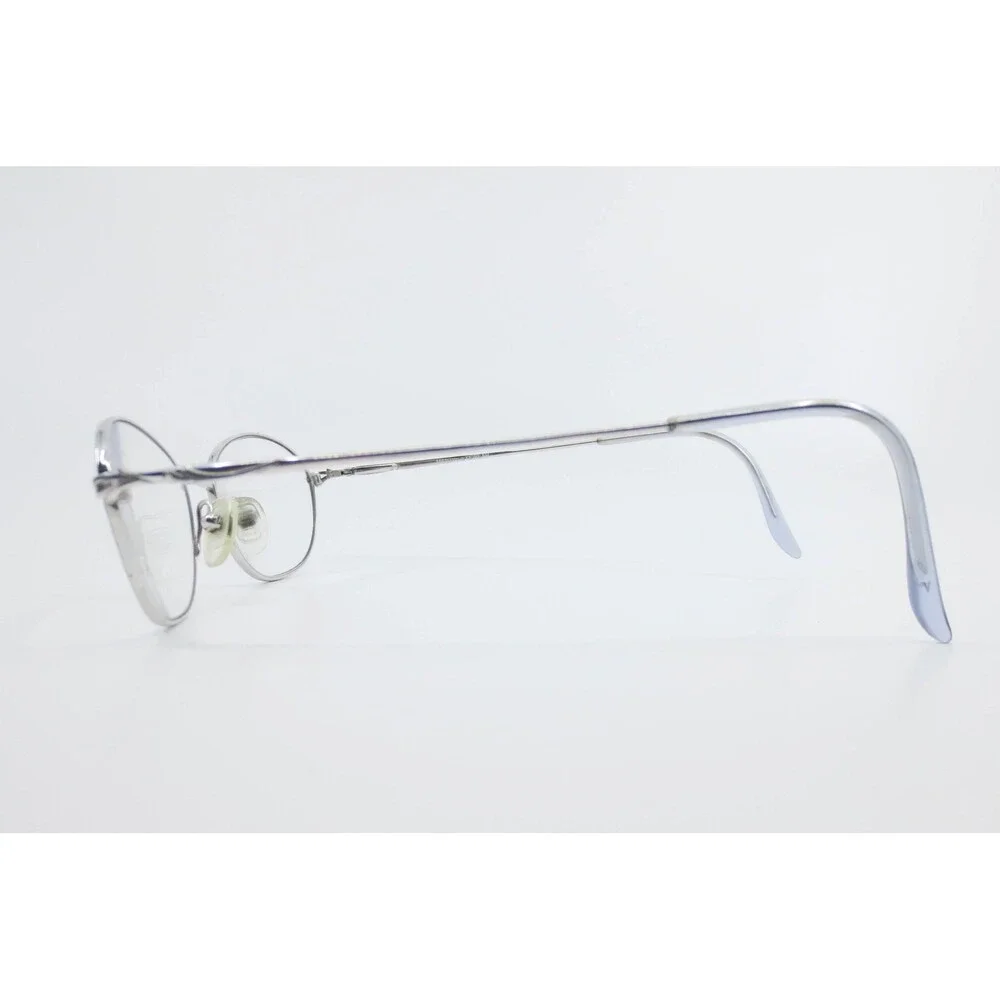 Manzini Eyewear Sea Mist 108 Titanium Oval Silver Frames 51-16-140 Demo Lenses